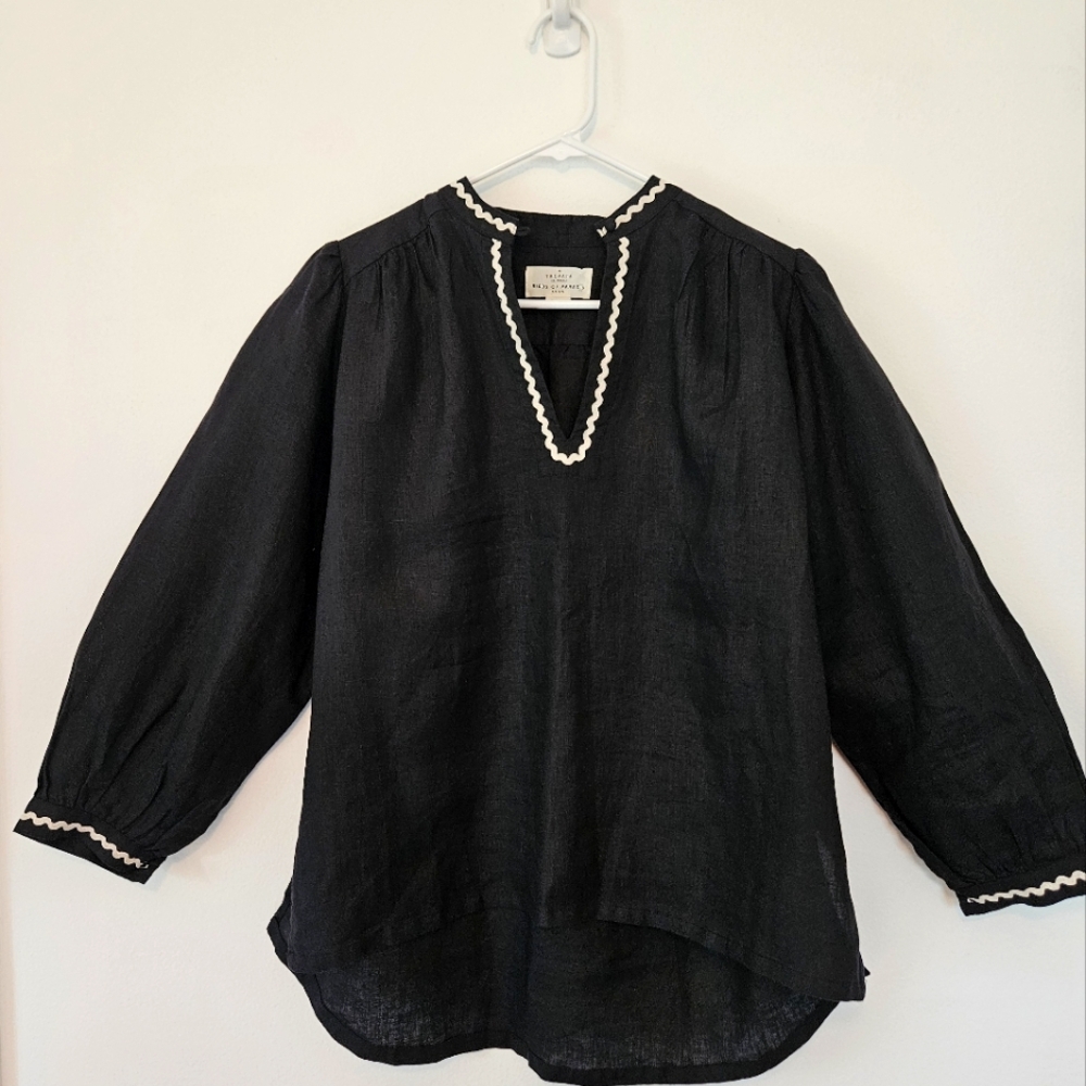 Elegant Trovata Black Blouse with White Trim